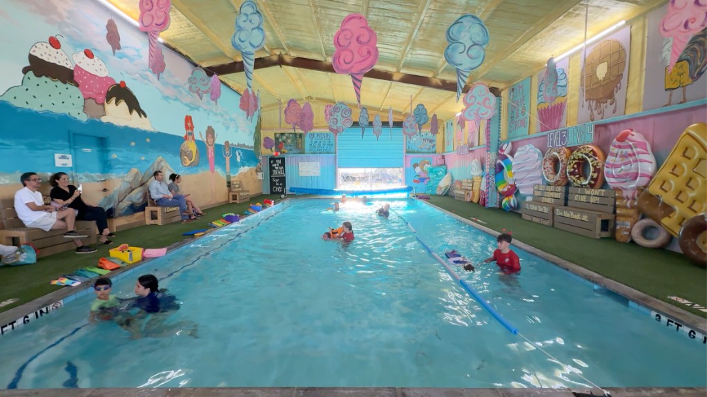 Children taking swim lessons in the indoor heated pool